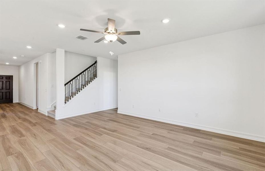 Airy gathering room showcases open concept floorplan Airy gathering room showcases open concept floorplan