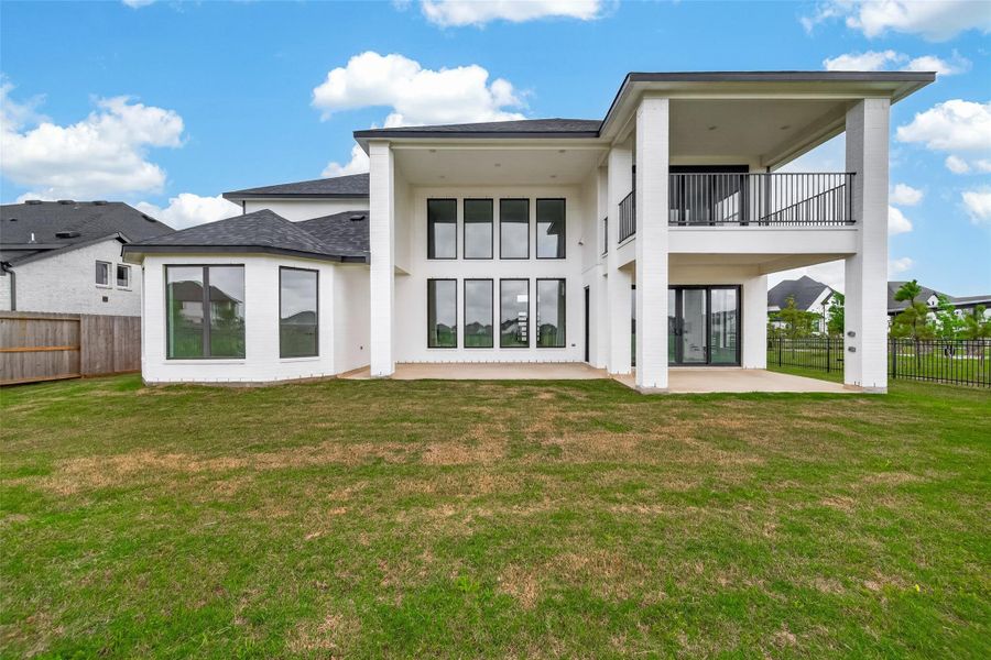 Exterior details and patio area of a home in , Brookshire (Image 29).