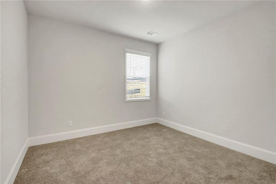 Spacious, unfurnished interior of a new home in Butner Estates, College Park (Image 31).