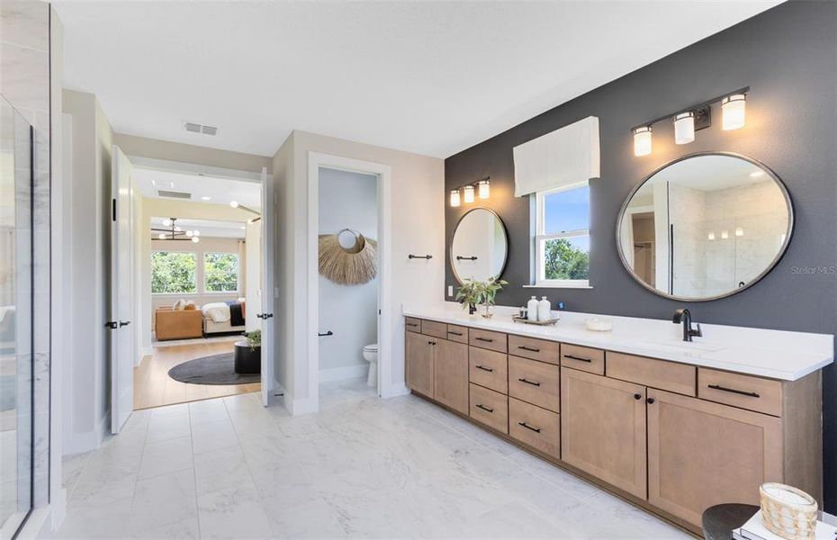 Furnished interior view inside a new home in The Estates at Nona Sound, Orlando (Image 34). Furnished interior view inside a new home in The Estates at Nona Sound, Orlando (Image 34).