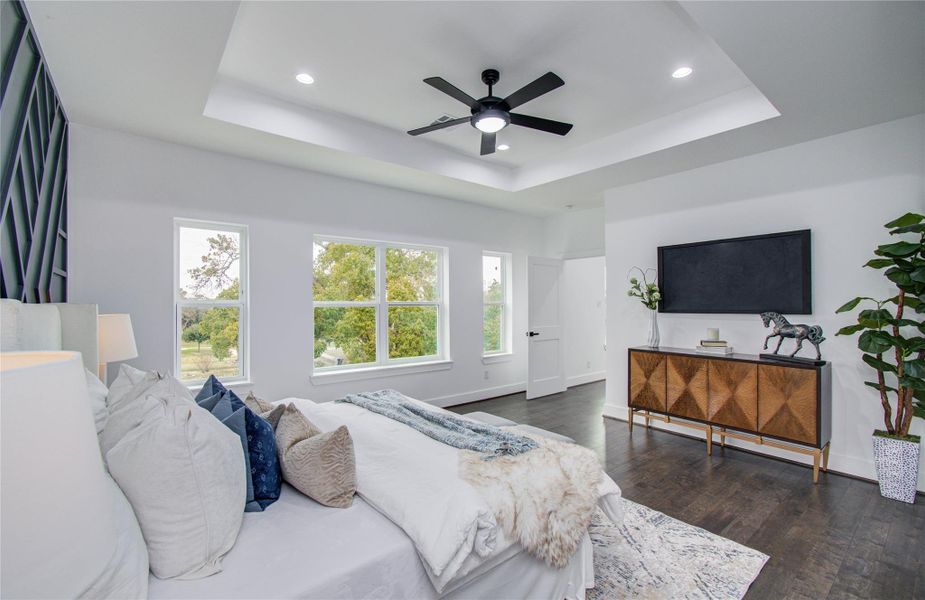 Primary bedroom with plenty of natural light