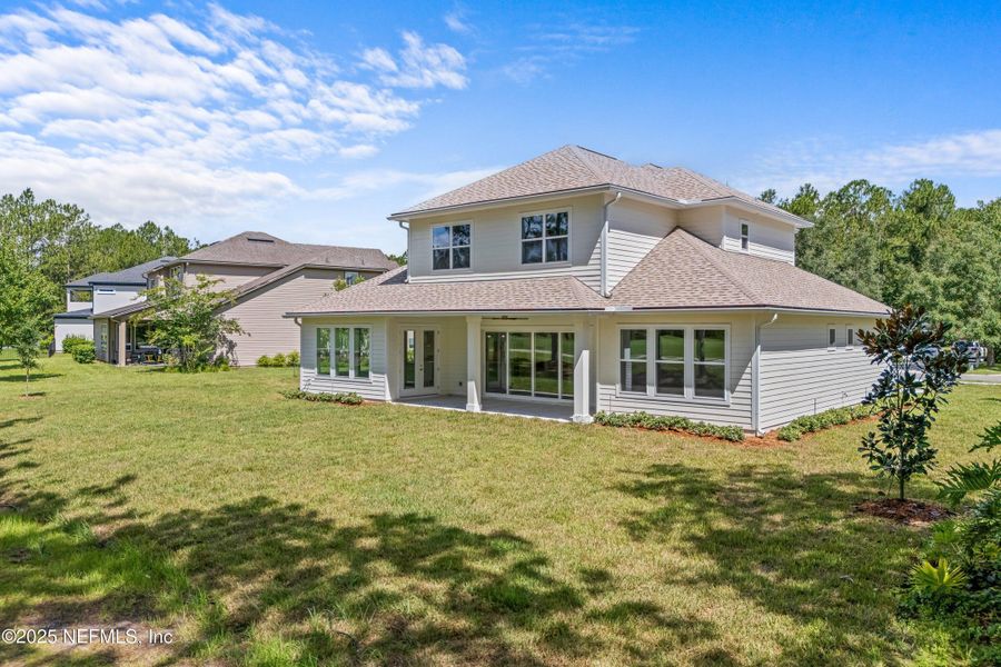 Front exterior of a new home in , Orange Park, FL, highlighting curb appeal (Image 23).