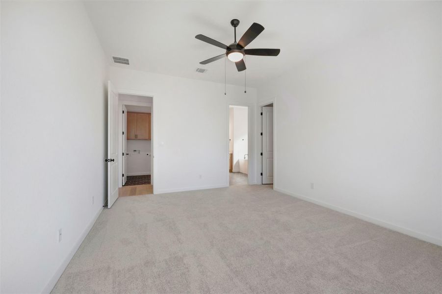 Spacious, unfurnished interior of a new home in Heritage, Dripping Springs (Image 33).