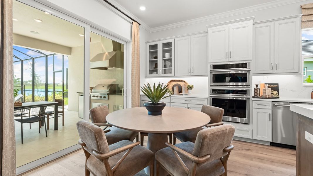 Furnished interior view inside a new home in Esplanade at Kingston, Estero (Image 10).