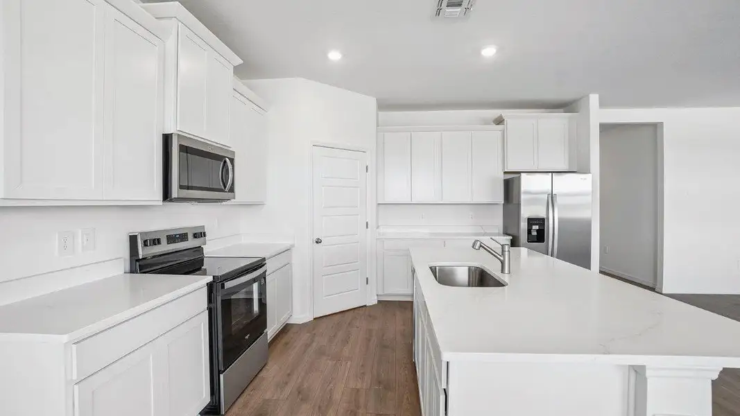 Furnished interior view inside a new home in Harmony at Lake Eloise, Winter Haven (Image 6).