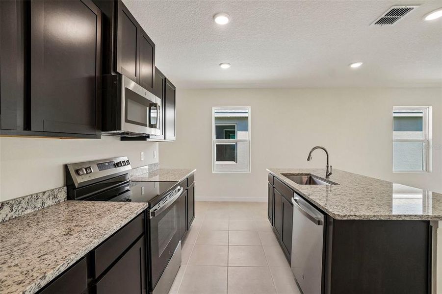 Furnished interior view inside a new home in Willowbrook North, Winter Haven (Image 14). Furnished interior view inside a new home in Willowbrook North, Winter Haven (Image 14).