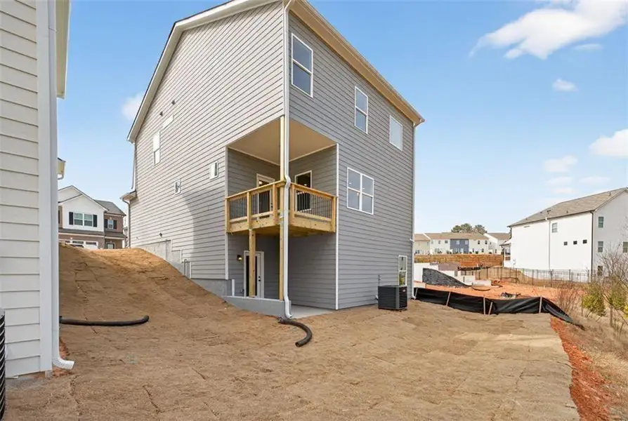 Exterior details and patio area of a home in Sanders Park, Austell (Image 4).