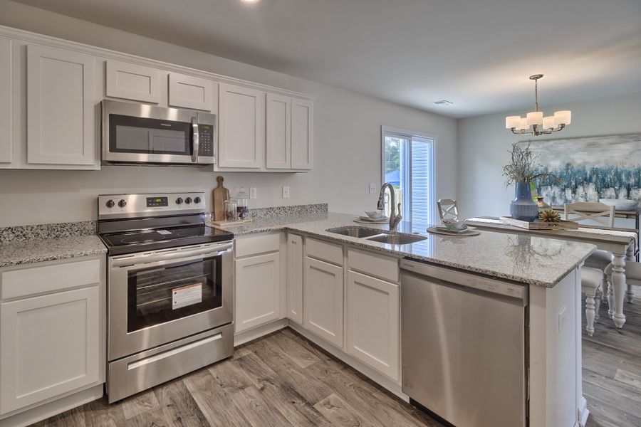 Representative furnished interior of a home built from the Poplar A by McGuinn Homes in Reserve at Mill Creek, Columbia (Image 8).