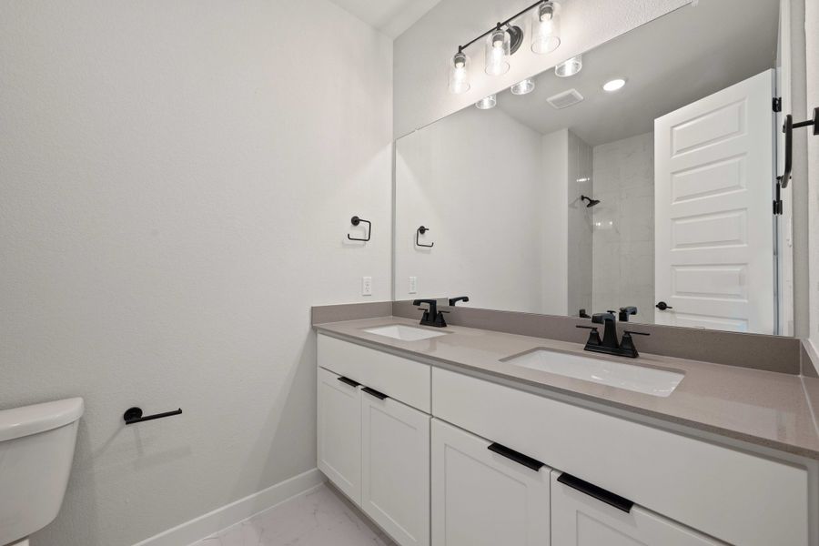 Furnished interior view inside a new home in Wolf Ranch, Georgetown (Image 20).