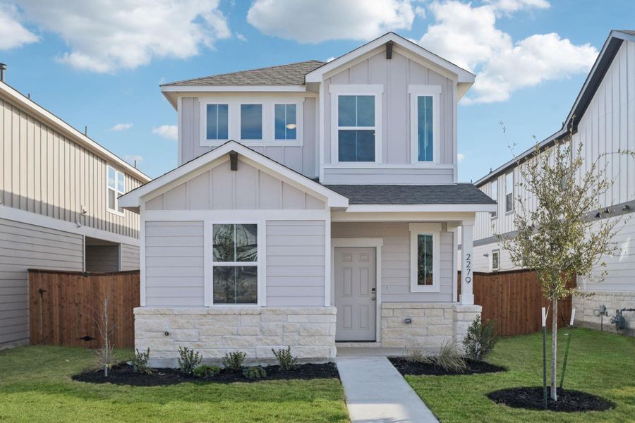 Front exterior of a new home in Avery Centre, Round Rock, TX, highlighting curb appeal (Image 1). Front exterior of a new home in Avery Centre, Round Rock, TX, highlighting curb appeal (Image 1).