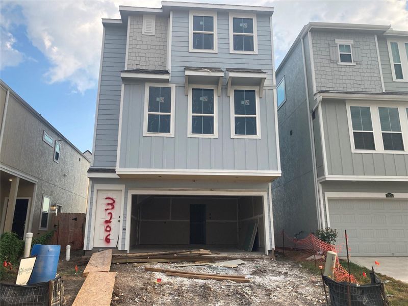 Three-story home with 3 bedrooms, 3.5 baths and 2 car garage