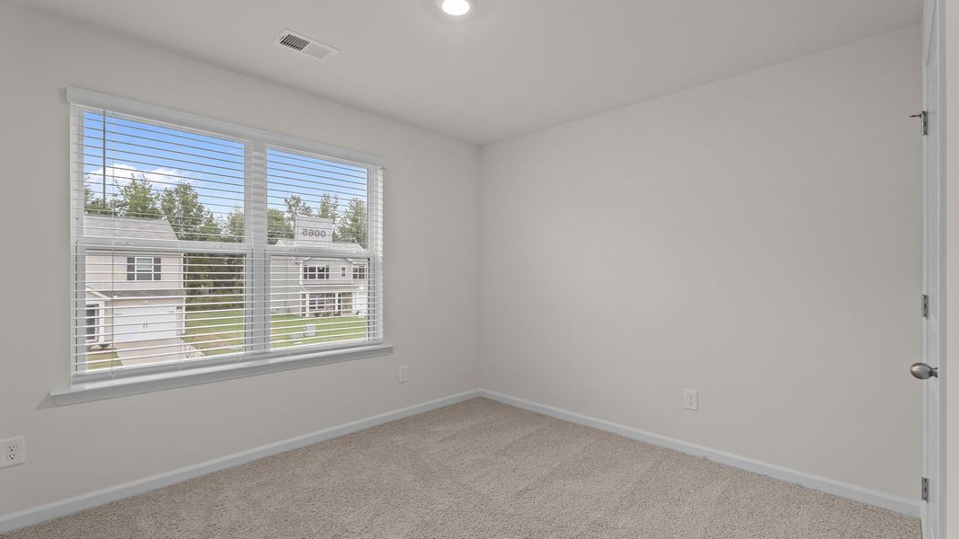 Spacious, unfurnished interior of a new home in Hobbs Farm, Ayden (Image 23).