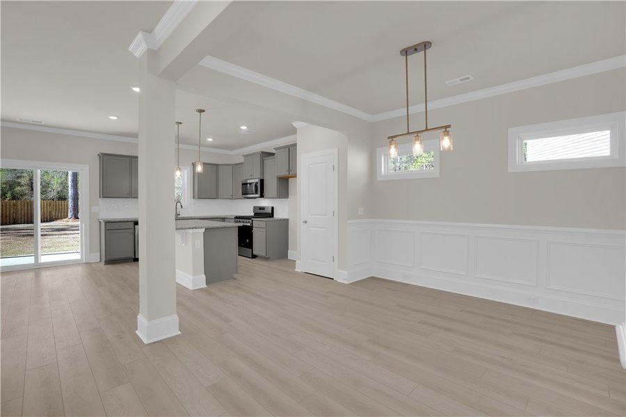 This open concept living area features sleek floor This open concept living area features sleek floor