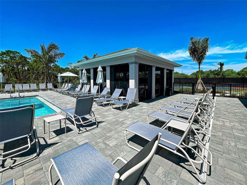 Front exterior of a new home in , Englewood, FL, highlighting curb appeal (Image 21).
