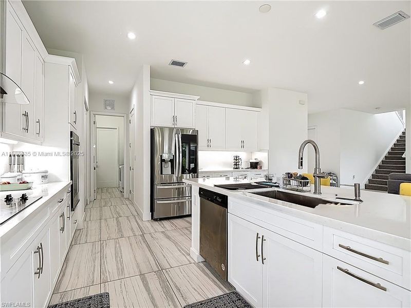 Furnished interior view inside a new home in , Ave Maria (Image 12). Furnished interior view inside a new home in , Ave Maria (Image 12).