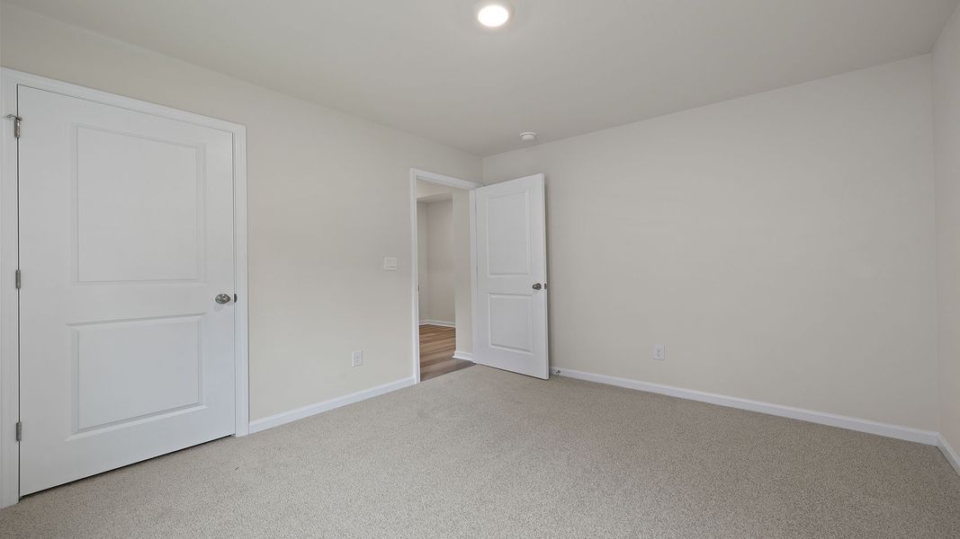 Spacious, unfurnished interior of a new home in Bentley Park, Greenwood (Image 25). Spacious, unfurnished interior of a new home in Bentley Park, Greenwood (Image 25).