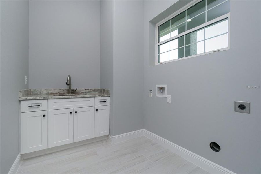 Furnished interior view inside a new home in , Port Charlotte (Image 9).