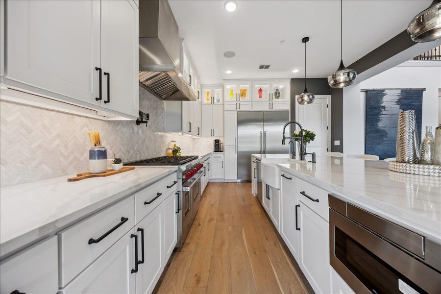 High End Appliances include 60In Thermador refrigerator, Wolf 8 burner Gas Range