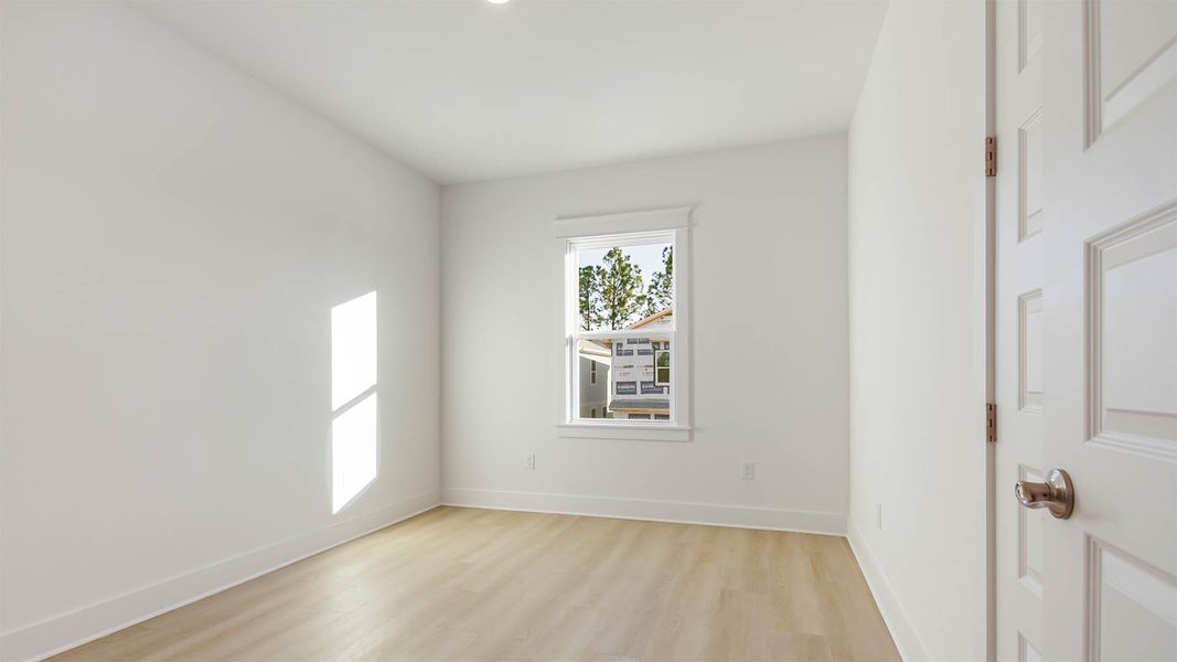 Representative unfurnished interior of a home built from the Trenton by D.R. Horton in Parkside, Santa Rosa Beach (Image 34).