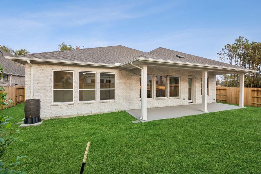 Exterior details and patio area of a home in ARTAVIA 65' Homesites, Conroe (Image 25). Exterior details and patio area of a home in ARTAVIA 65' Homesites, Conroe (Image 25).