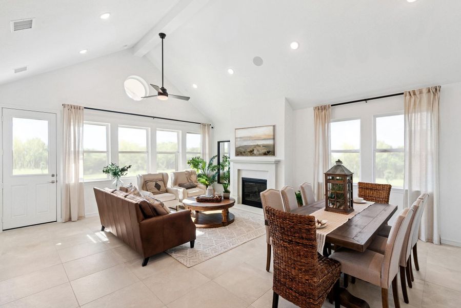 Bright and open living area with vaulted ceilings (*Photo not of actual home and used for illustration purposes only.)