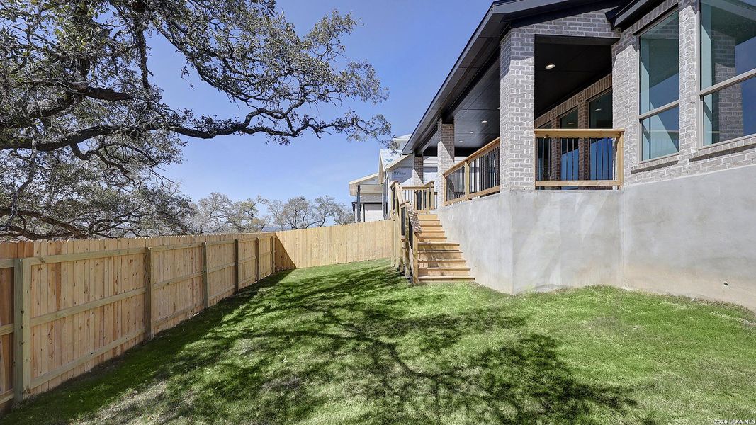 Exterior details and patio area of a home in The Ranches at Creekside, Boerne (Image 3).
