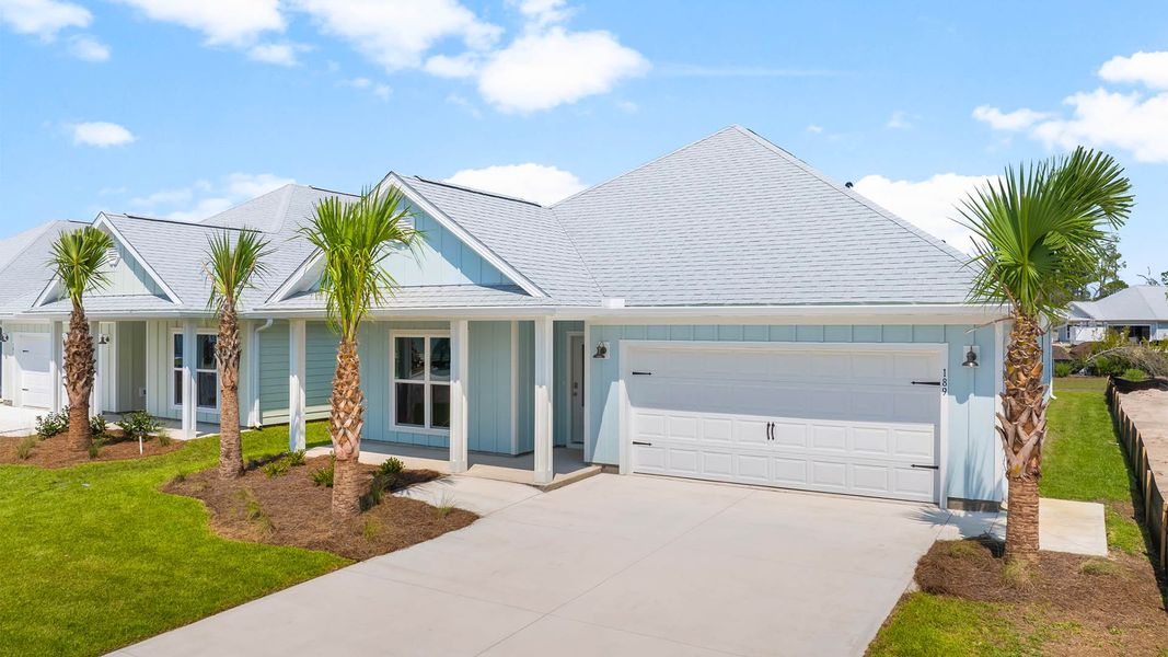 Front exterior of a new home in Windmark Beach, Port Saint Joe, FL, highlighting curb appeal (Image 2).