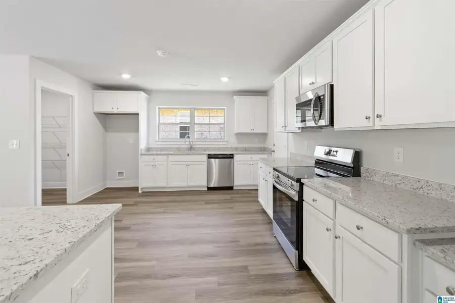 Representative furnished interior of a home built from the 3000 by Adams Homes in Flagler Estates, Hastings (Image 5).