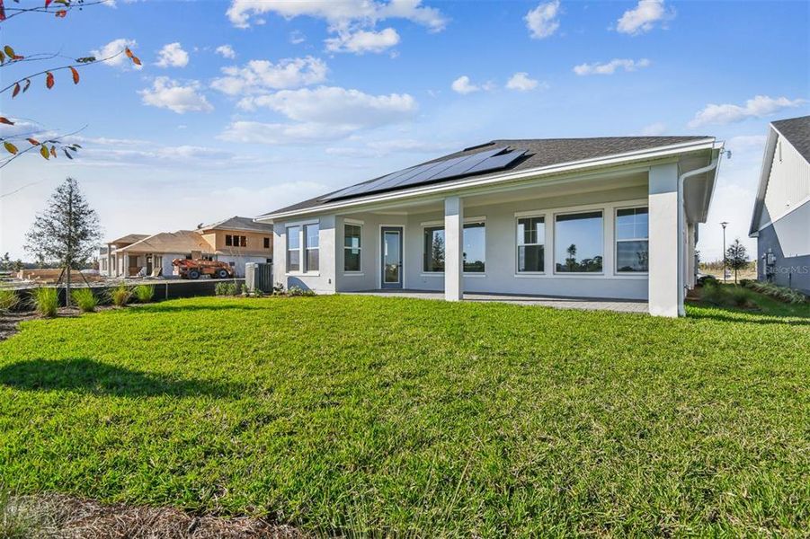 Exterior details and patio area of a home in Laureate Park at Lake Nona - Park Series, Orlando (Image 23).