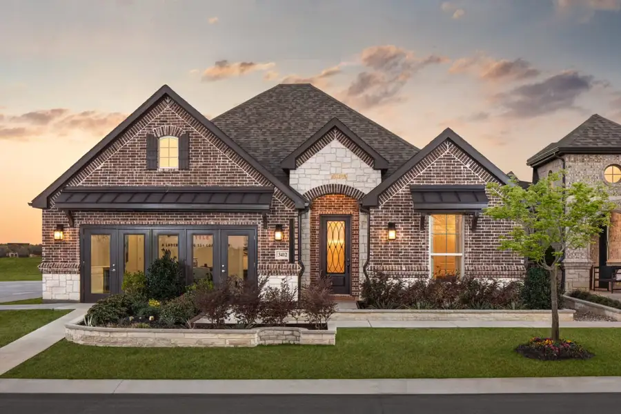 Representative exterior photo of a completed home built from the Torino by Ladera Texas in Ladera at The Reserve, Mansfield, TX (Image 2). Representative exterior photo of a completed home built from the Torino by Ladera Texas in Ladera at The Reserve, Mansfield, TX (Image 2).