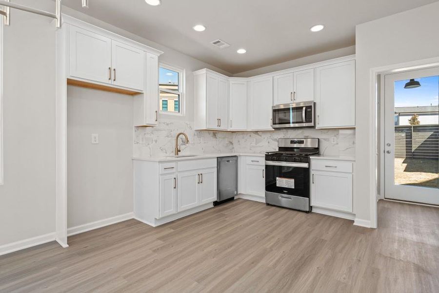 Furnished interior view inside a new home in Harmony, Auburn (Image 6).