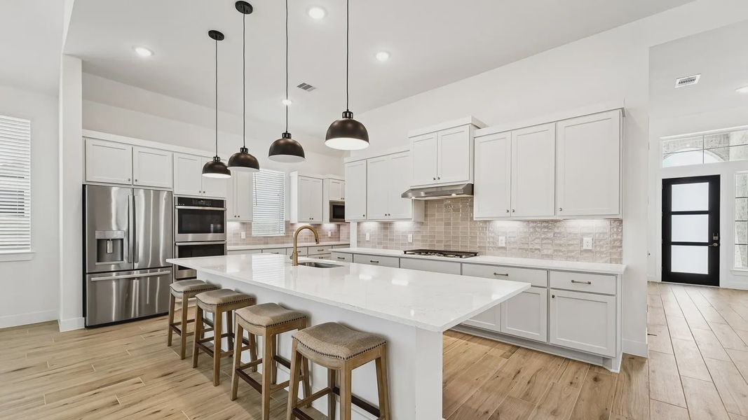 Representative furnished interior of a home built from the Cayman by Chesmar Homes in Crescent Bluff, Georgetown (Image 8).