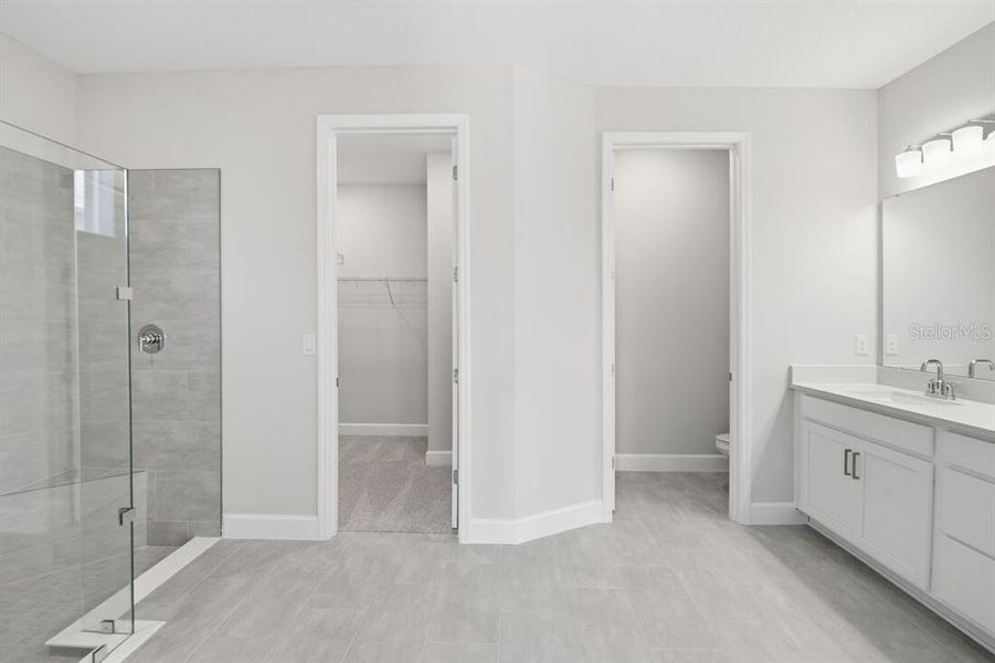 Furnished interior view inside a new home in Harvest at Ovation, Winter Garden (Image 5).