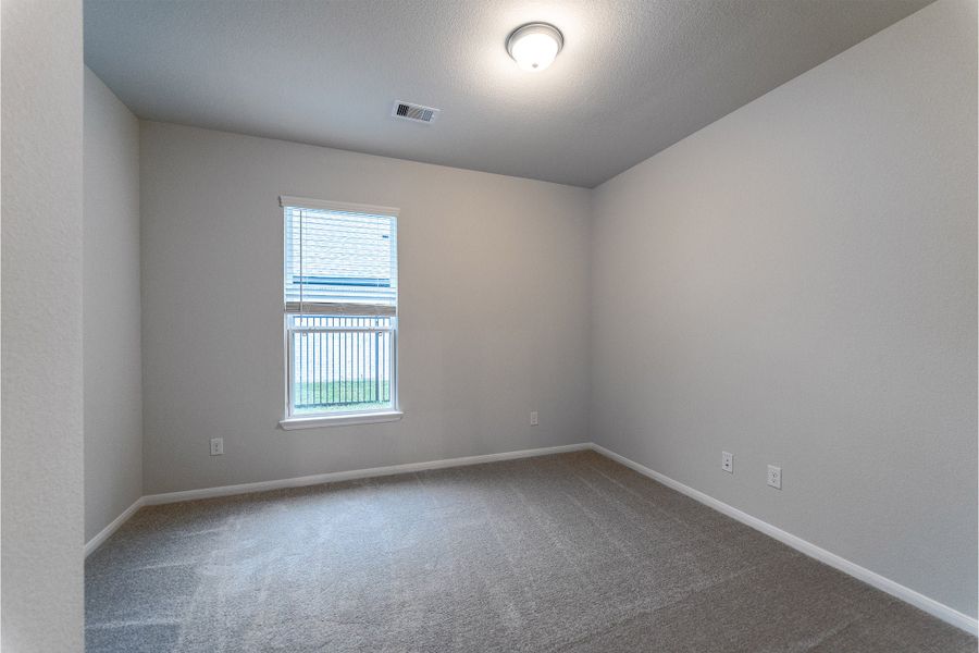 Spacious, unfurnished interior of a new home in Canterra Creek, Rosharon (Image 22).