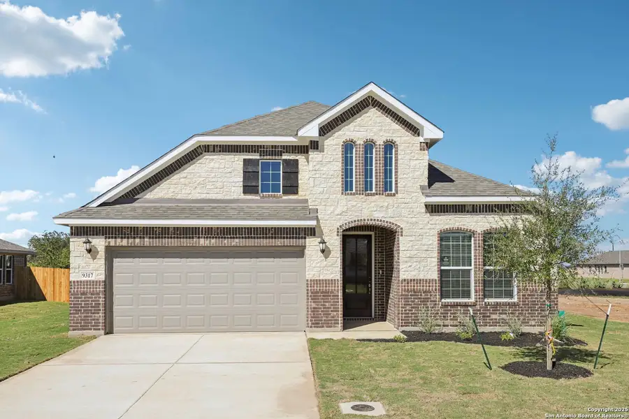 Front exterior of a new home in Carmel Ranch, Schertz, TX, highlighting curb appeal (Image 2).