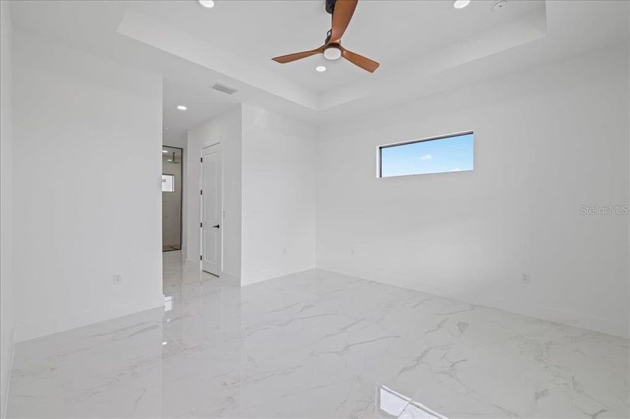 Spacious, unfurnished interior of a new home in , Port Charlotte (Image 22).
