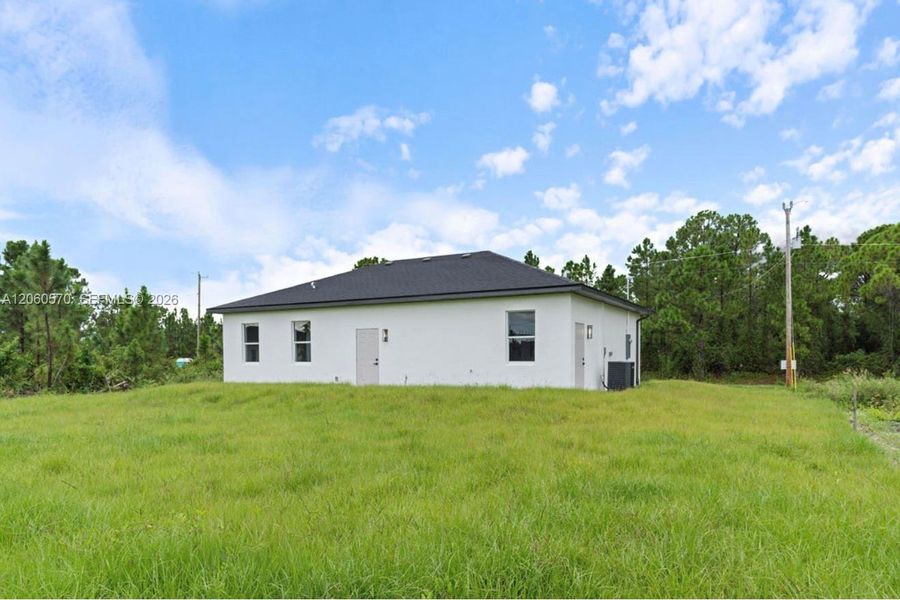 Exterior details and patio area of a home in , Lehigh Acres (Image 25).