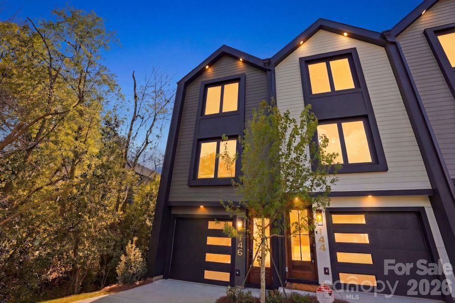 Front exterior of a new home in , Charlotte, NC, highlighting curb appeal (Image 27).
