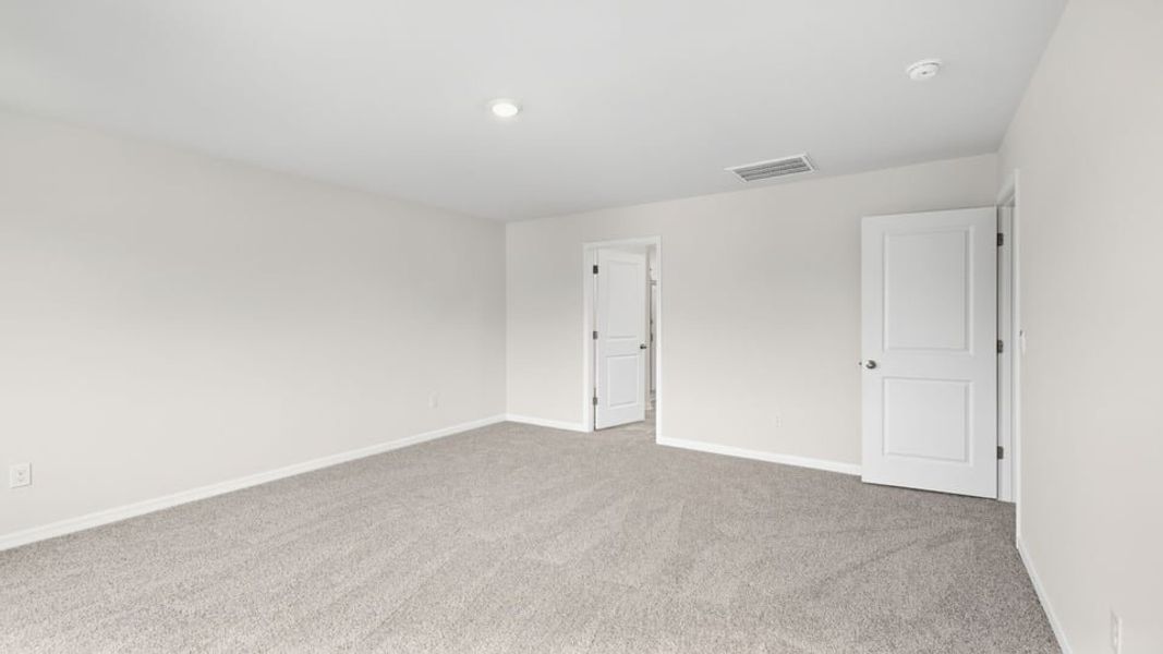 Spacious, unfurnished interior of a new home in Durbin Meadows Traditions, Fountain Inn (Image 36).