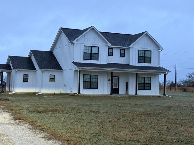 Front exterior of a new home in , Point, TX, highlighting curb appeal (Image 1).