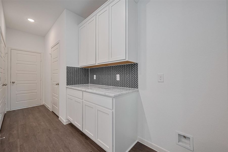Furnished interior view inside a new home in Mill Creek Trails, Magnolia (Image 3).