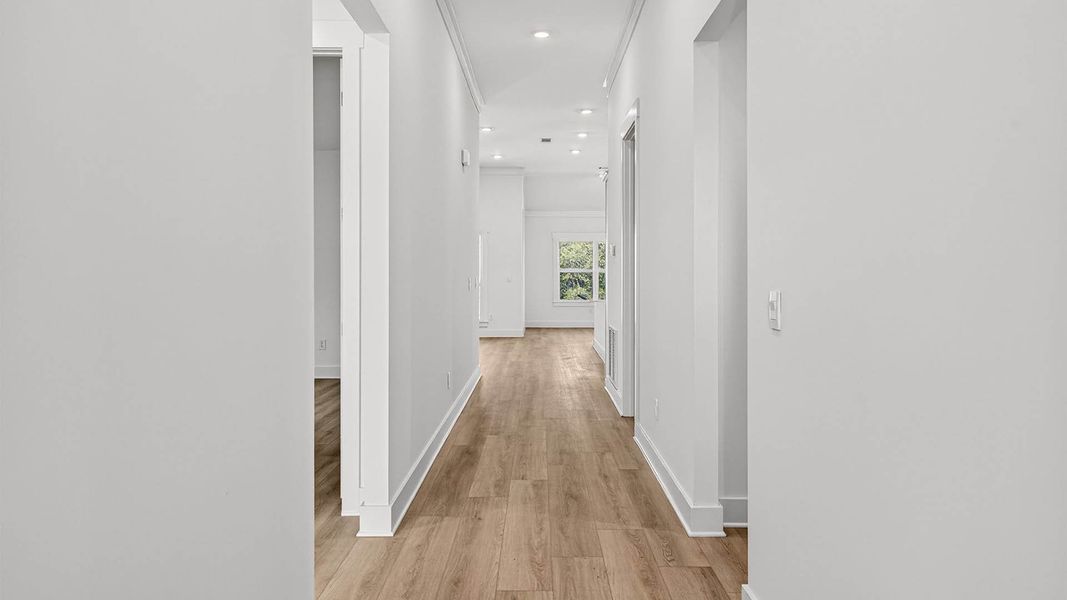 Representative unfurnished interior of a home built from the The Lily by D.R. Horton in WindMark Beach, Port Saint Joe (Image 17).