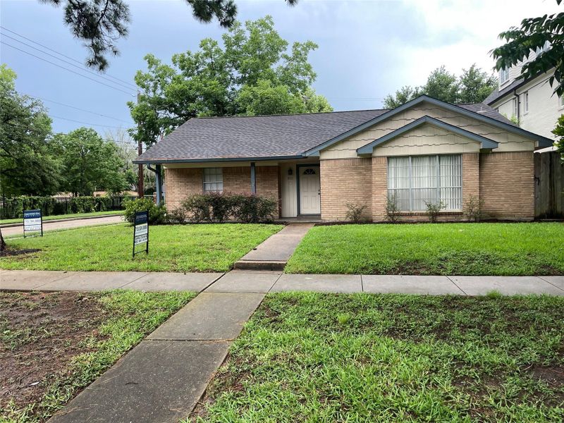 Front exterior of a new home in , West University Place, TX, highlighting curb appeal (Image 2).