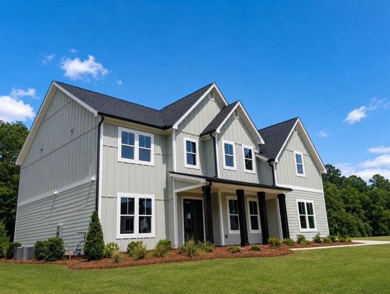 Front exterior of a new home in White Post on Lake Lanier, Gainesville, GA, highlighting curb appeal (Image 2). Front exterior of a new home in White Post on Lake Lanier, Gainesville, GA, highlighting curb appeal (Image 2).