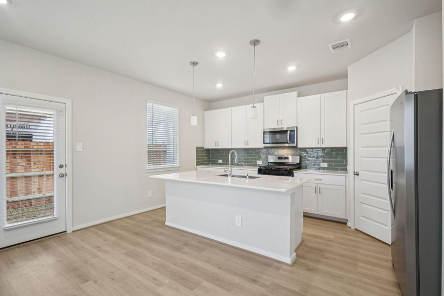 Furnished interior view inside a new home in Pinewood Trails - City Series, Atascocita (Image 6).