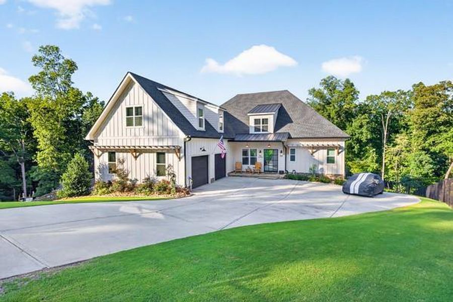Front exterior of a new home in , Gainesville, GA, highlighting curb appeal (Image 2). Front exterior of a new home in , Gainesville, GA, highlighting curb appeal (Image 2).