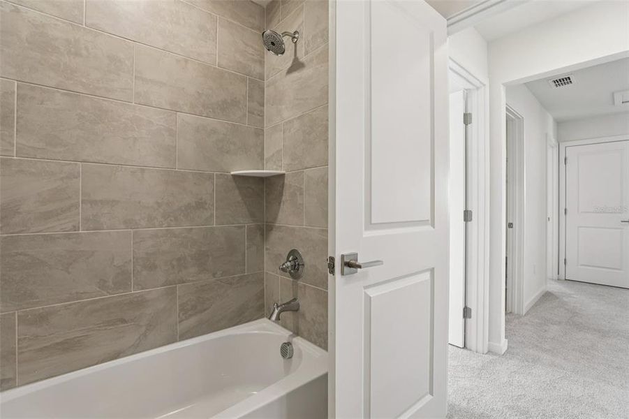 Furnished interior view inside a new home in Cyrene at Harmony, St. Cloud (Image 18). Furnished interior view inside a new home in Cyrene at Harmony, St. Cloud (Image 18).