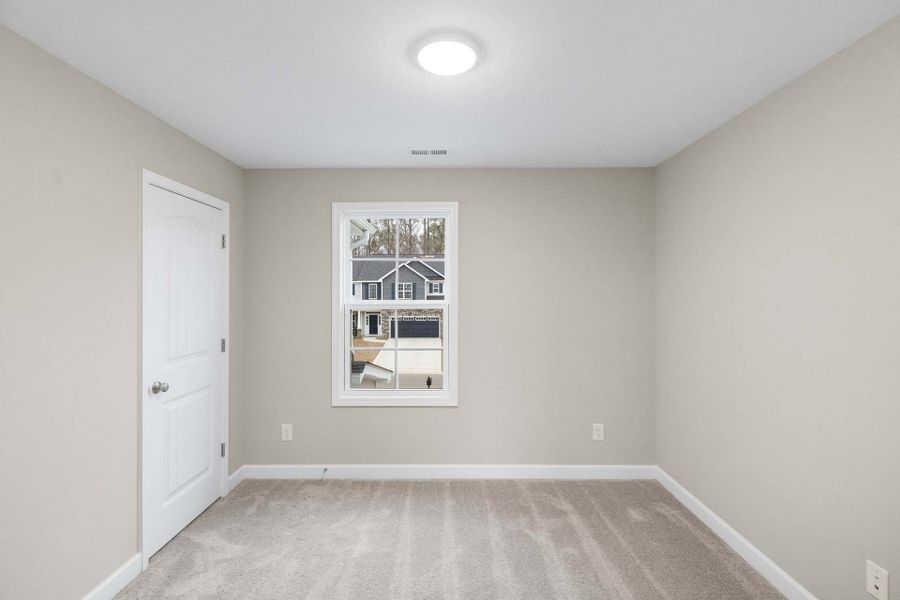 Representative unfurnished interior of a home built from the Aberdeen by Caviness & Cates Communities in Bartlett Manor, Youngsville (Image 177).