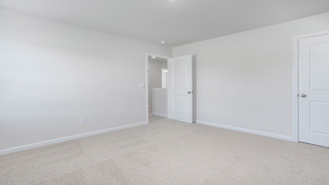 Representative unfurnished interior of a home built from the Penwell by D.R. Horton in The Preserve at Kinsley, Jamestown (Image 25).