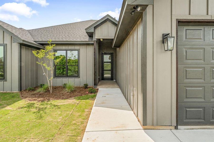Front exterior of a new home in , Bluff Dale, TX, highlighting curb appeal (Image 23).